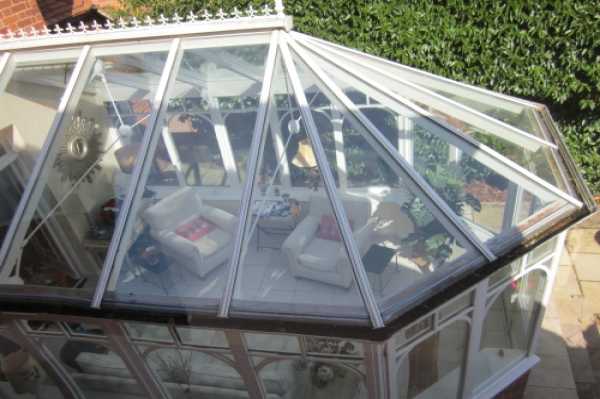 This shows the intricate glass roof system.